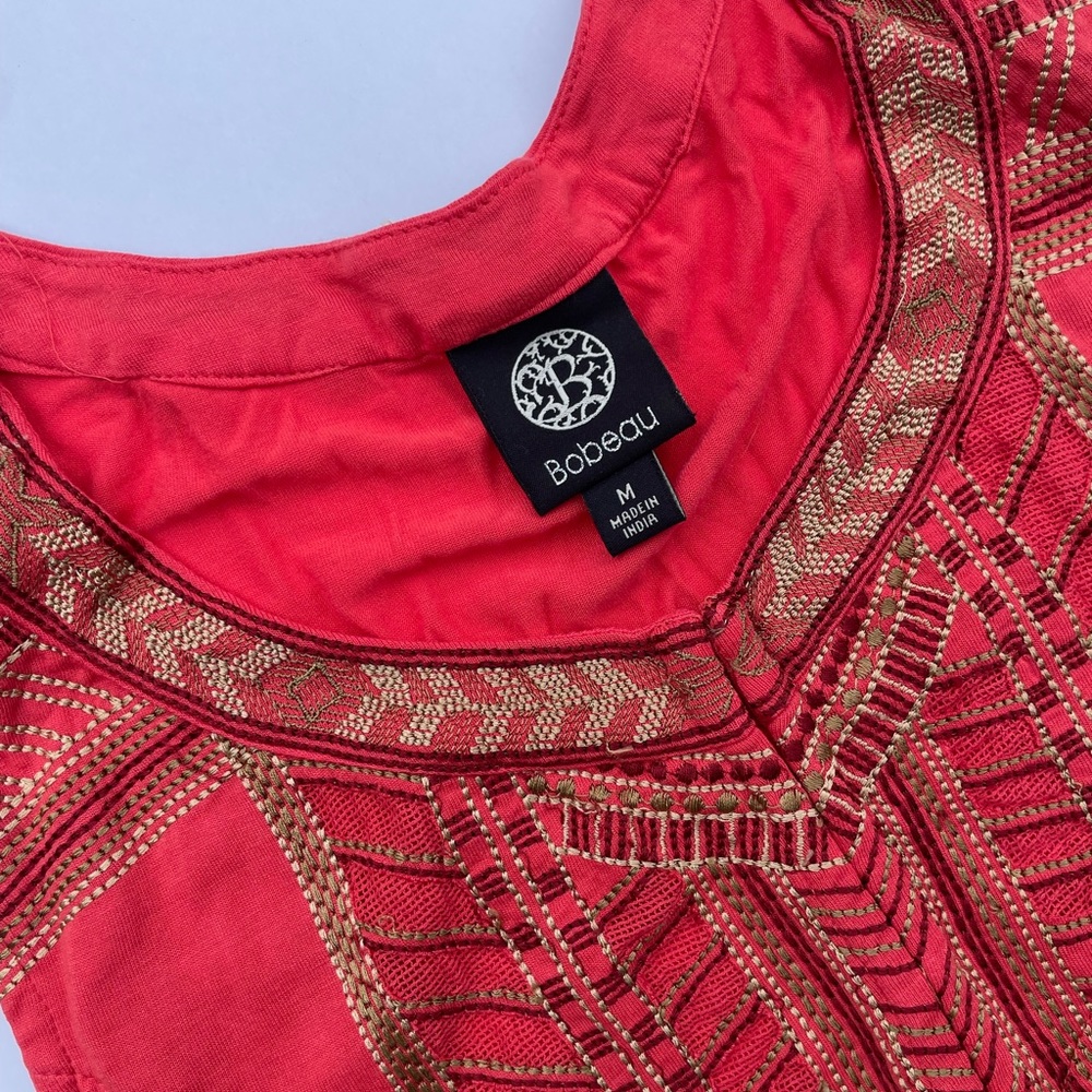 Great shirt with embroidery detail and soft 100% Rayon